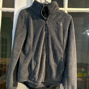North Face zip up, gray size small fits closer to a medium